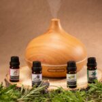 Wooden diffuser with essential oils, perfect for relaxation and aromatherapy needs.